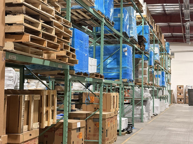 PLumbing supply warehouse shelves with commercial plumbing supplies